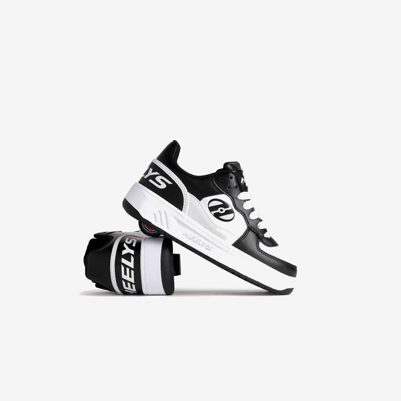 Zapatillas con ruedas negra y blanca niño