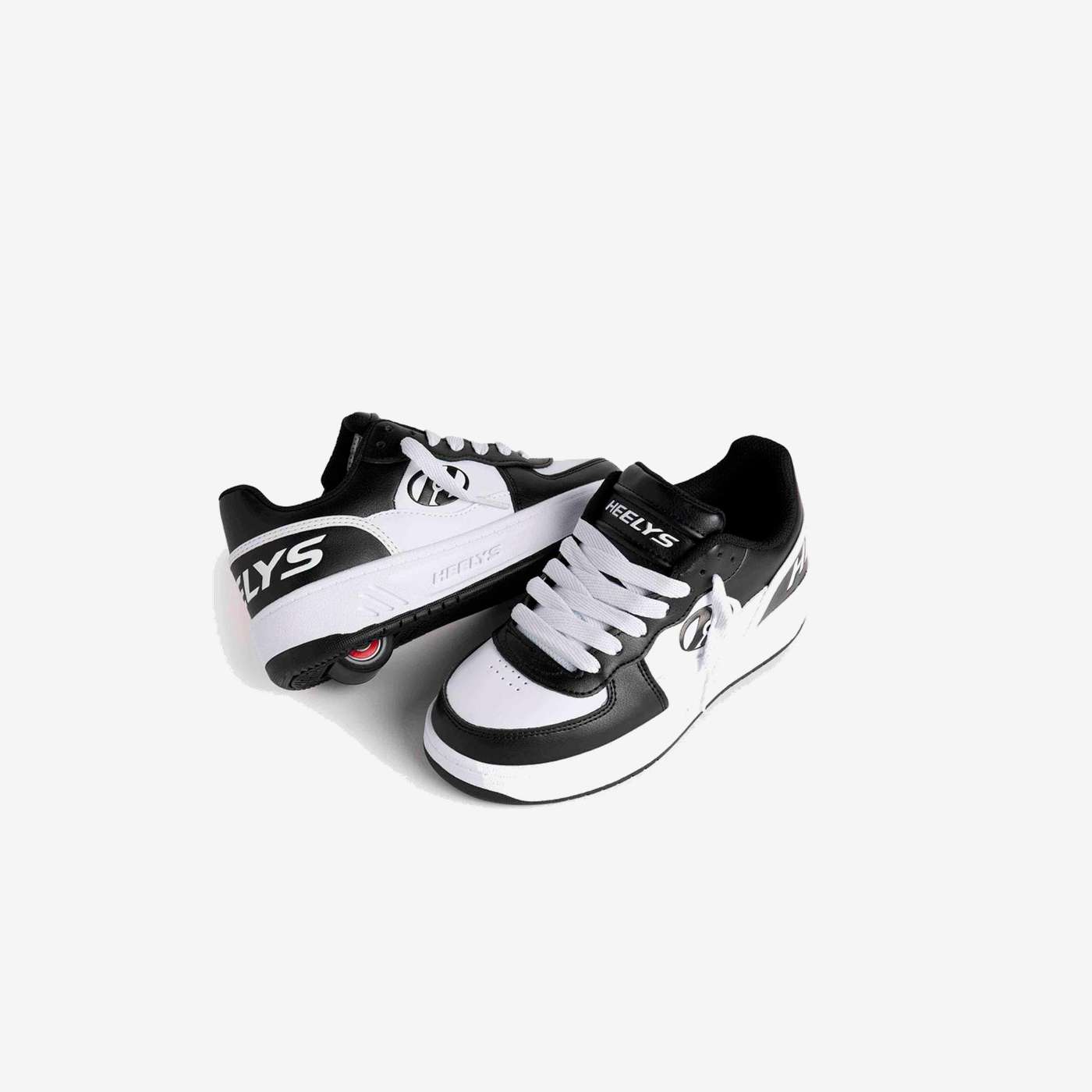 Zapatillas con ruedas negra y blanca niño