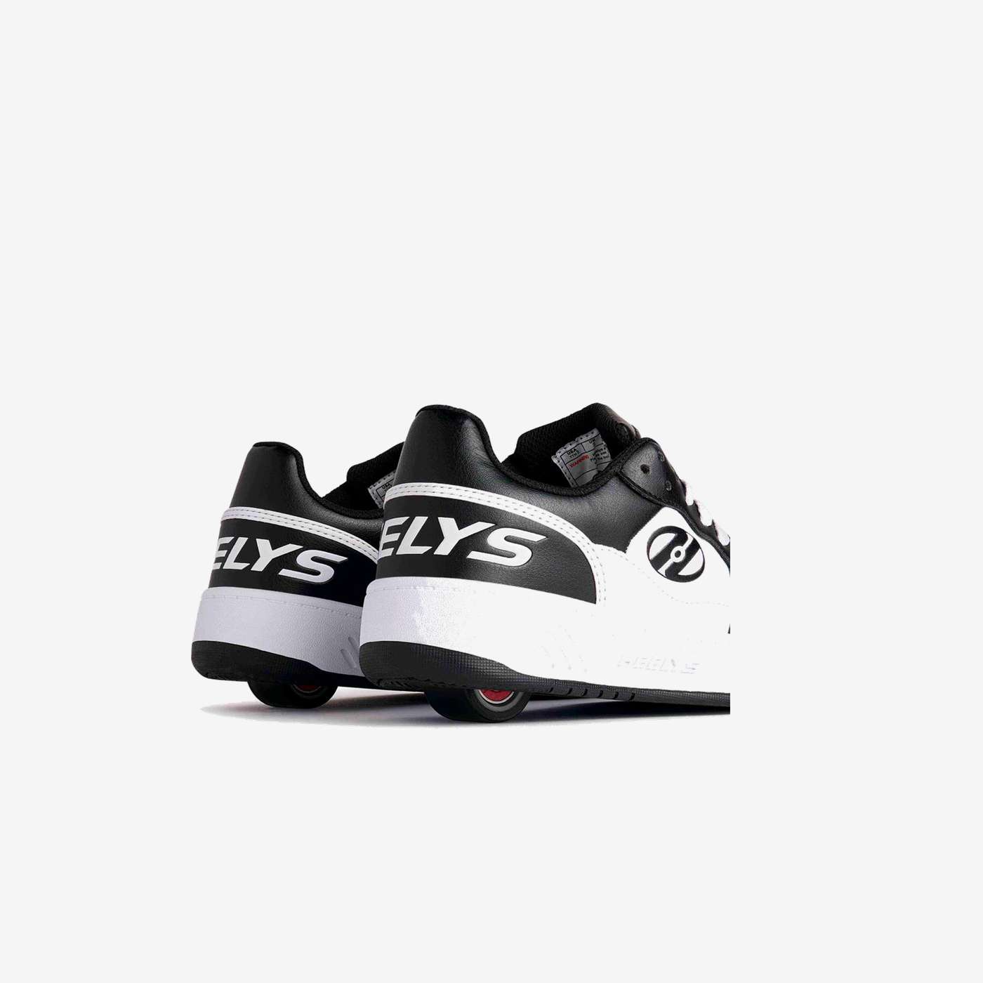 Zapatillas con ruedas negra y blanca niño
