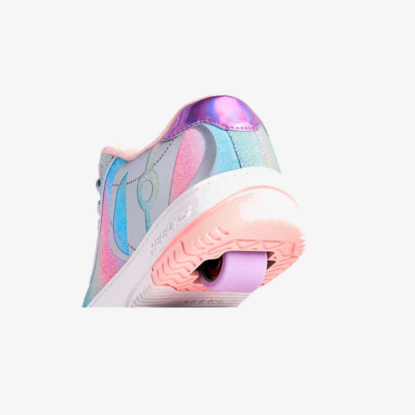 Heelys arcoíris para niña, con ruedas desmontables y diseño brillante. Comodidad, estilo y diversión que acompañan cada movimiento.
