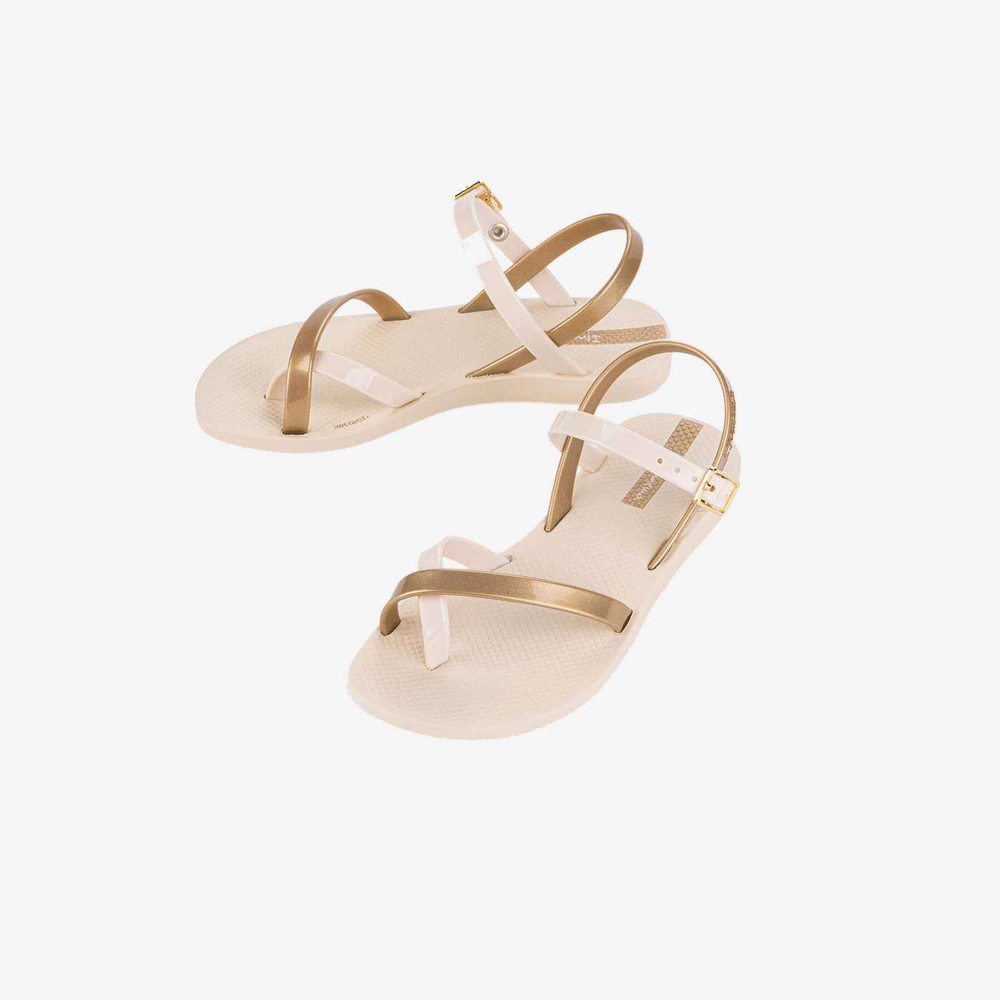Sandalias playeras en beige y dorada de Ipanema