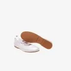 Merceditas de niña de piel nacarado en blanco con velcro.