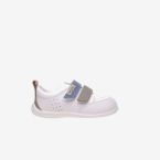 Deportivos respetusos primeros pasos con velcro y puntera reforzada en blanco con tiras en azul y verde.