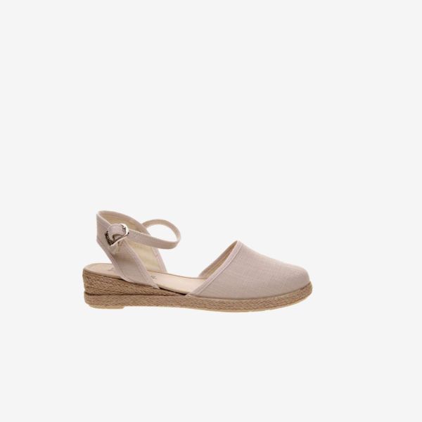 Sandalia esparteña de lona beige con hebilla para niña.