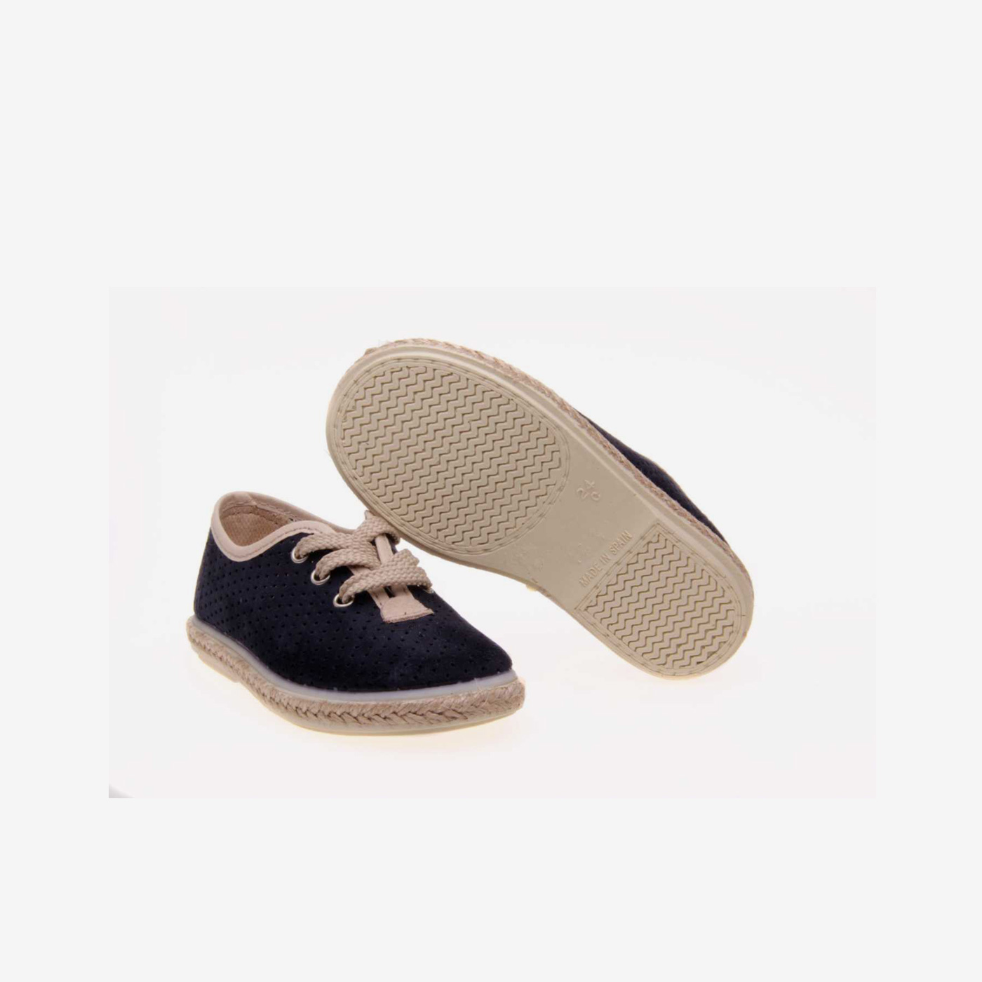 Lona de niño en serraje perforada con cordón