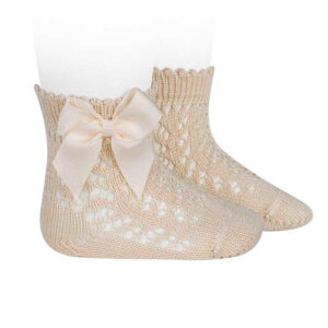 Calcetines de Condor azul marino con lazo para niña. Suaves, transpirables y con un toque elegante que combina con todo, de diario o de fiesta.