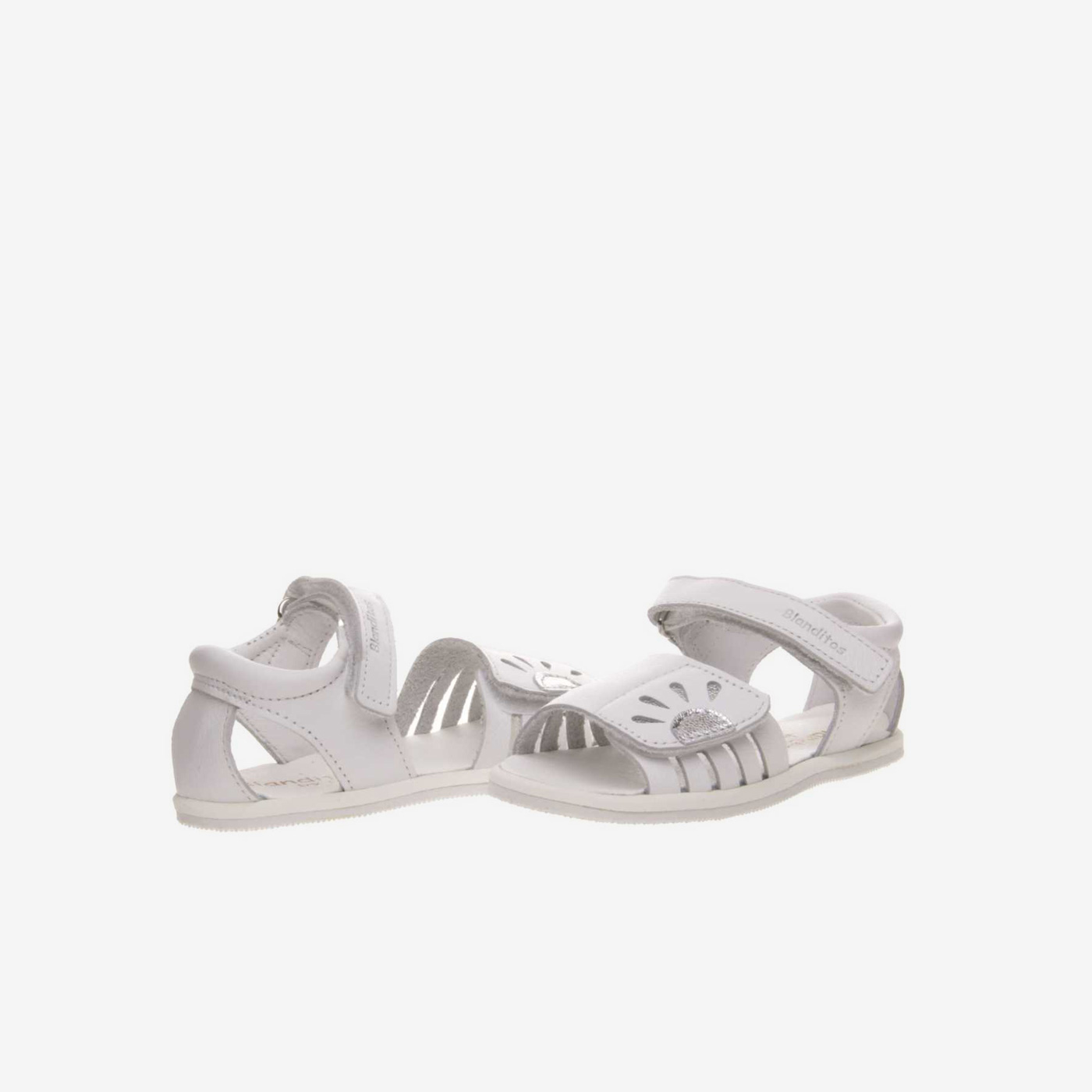 Sandalia de niña respetuosa con velcros.