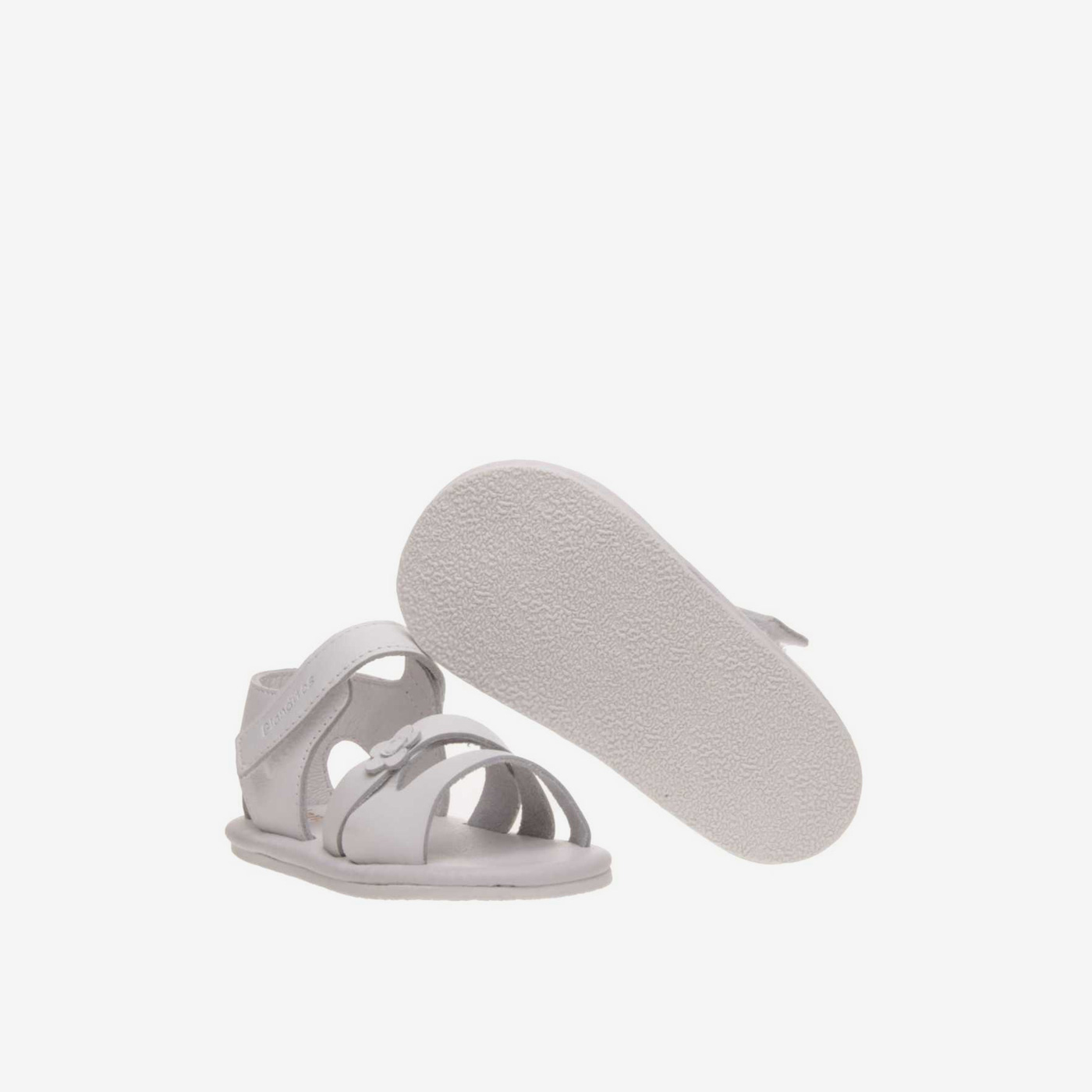 Sandalia de niña respetuosa en color blanco con velcro.