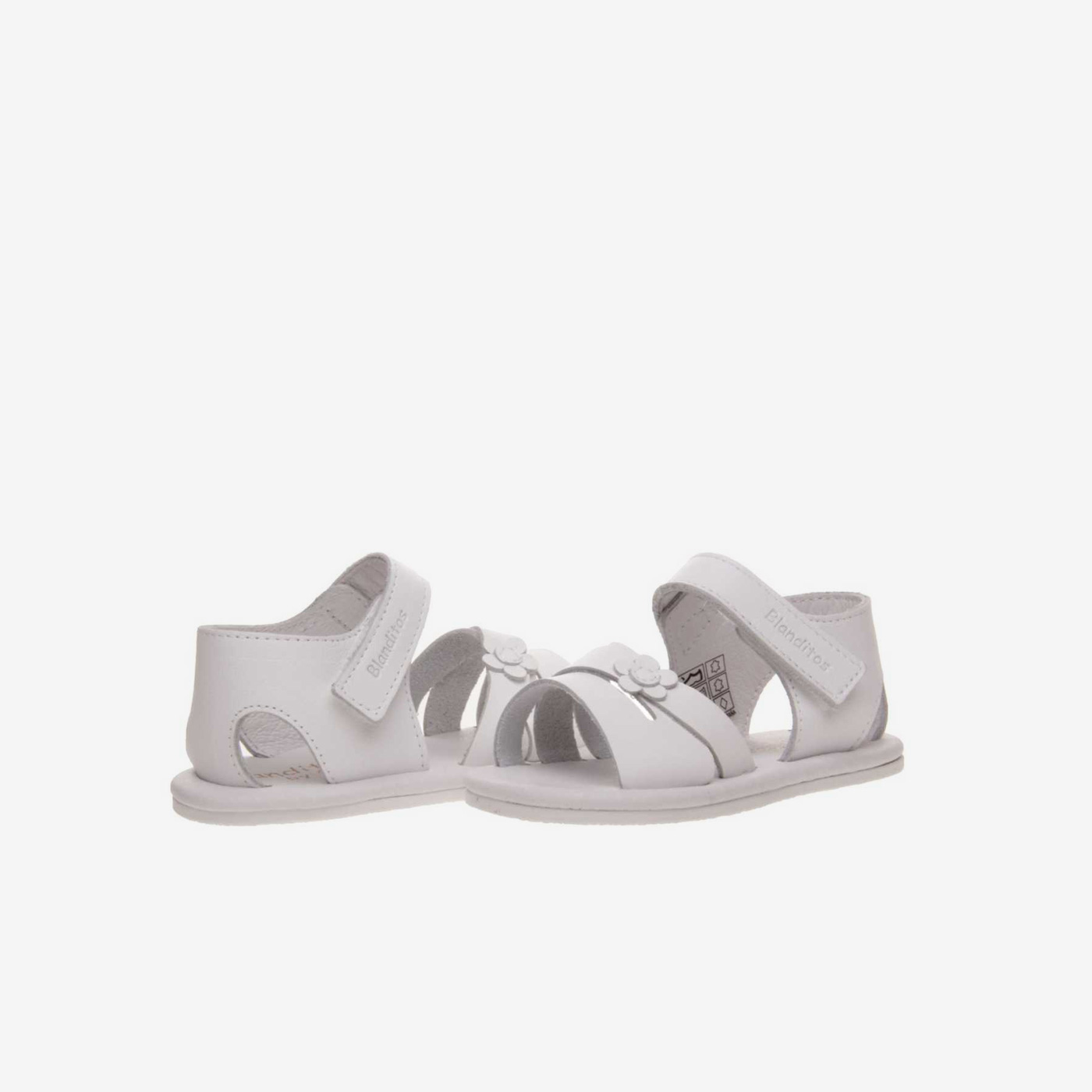 Sandalia de niña respetuosa en color blanco con velcro.