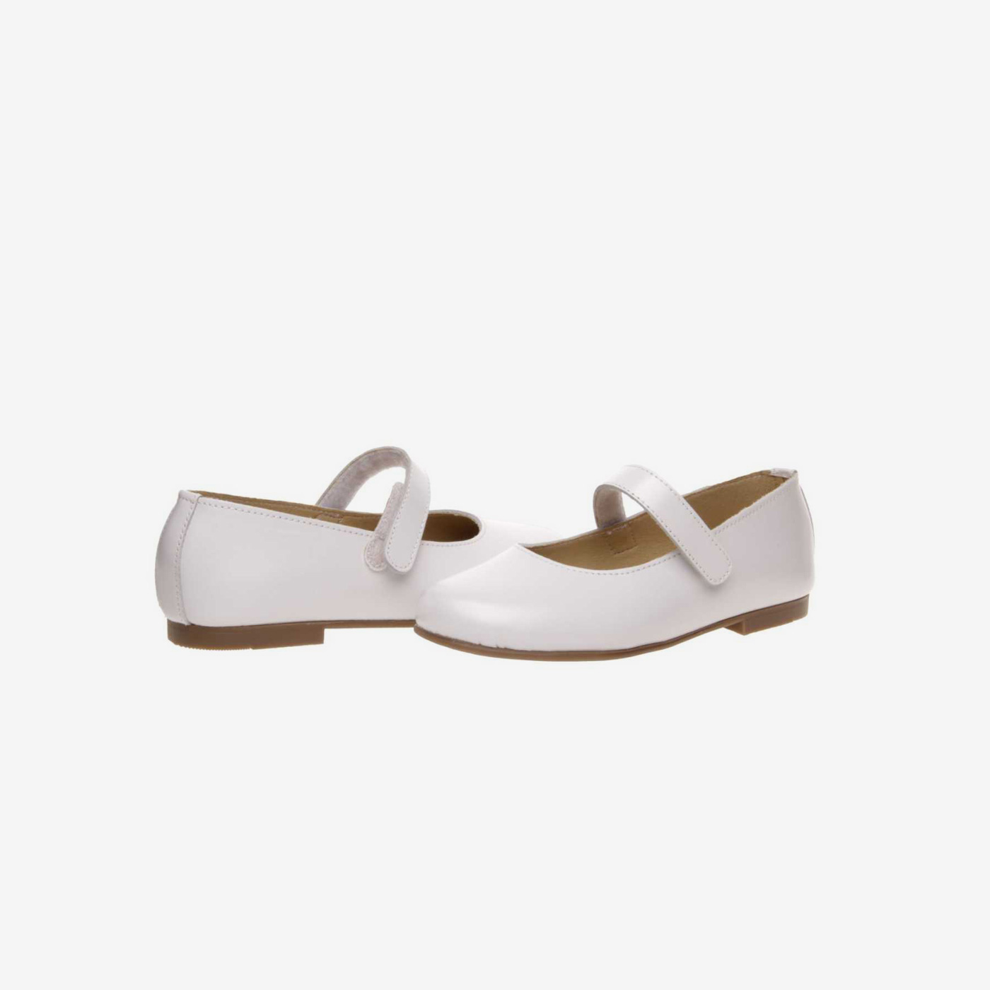 Merceditas fino de niña con velcro en color blanco.