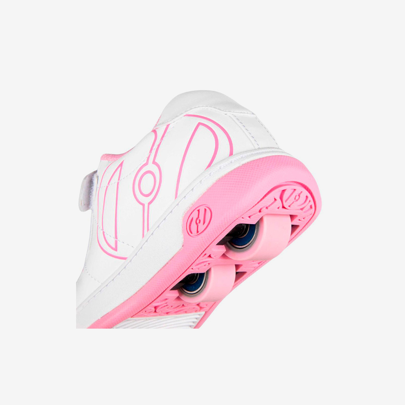 Heelys blancas y rosas con ruedas desmontables y cierre de velcro. Comodidad, confianza y diversión para cada paso de tu pequeña.