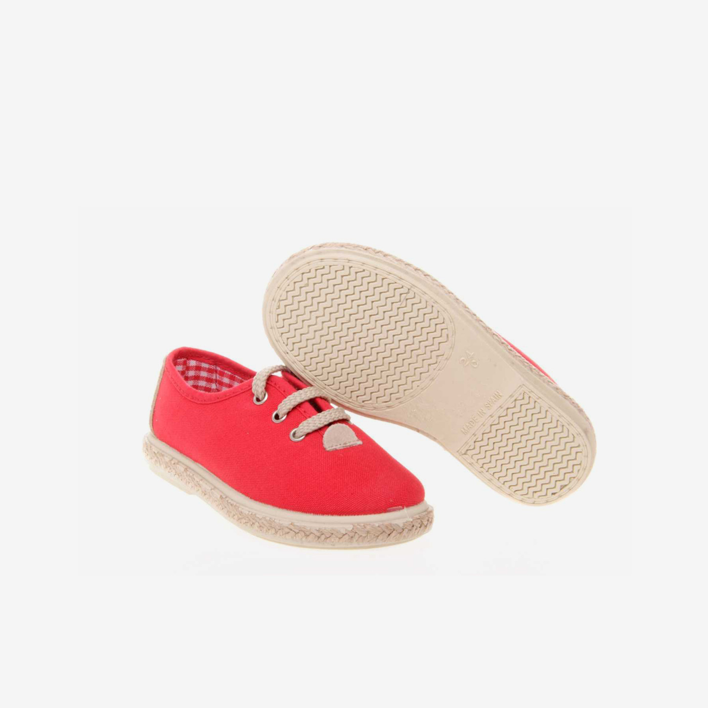 Lona de cordones unisex en color rojo.
