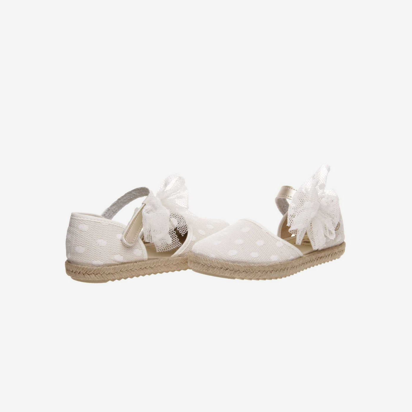 Esparteña de niña con encaje en color beige con lazo de tul.