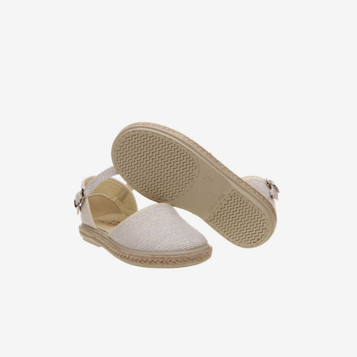 Sandalia de lona de niña en beige con hebilla.