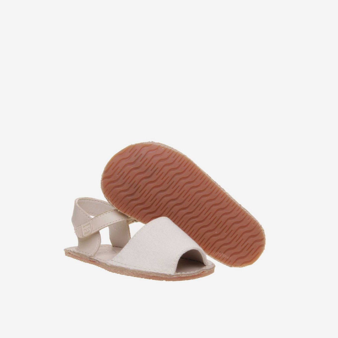 Sandalia menorquina respetuosa unisex de Piruflex - Lino beige y suela flexible.