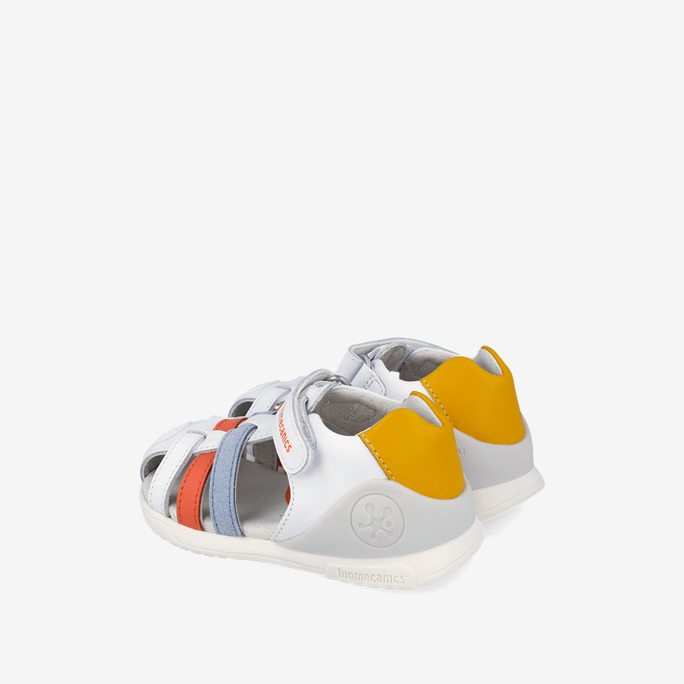 Sandalia blanco con un toque azul y rojo con velcro de la marca Biomecanics