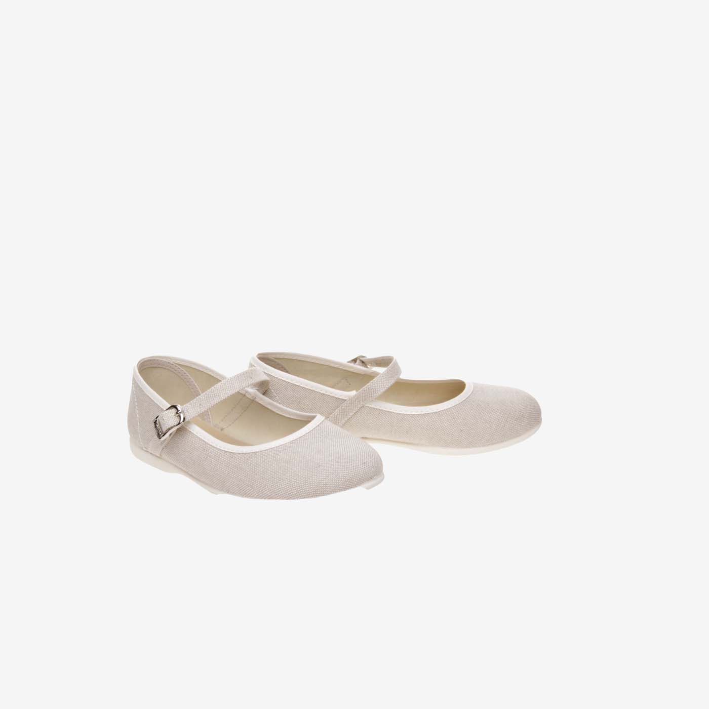 Mercedes de lona en beige con hebilla.