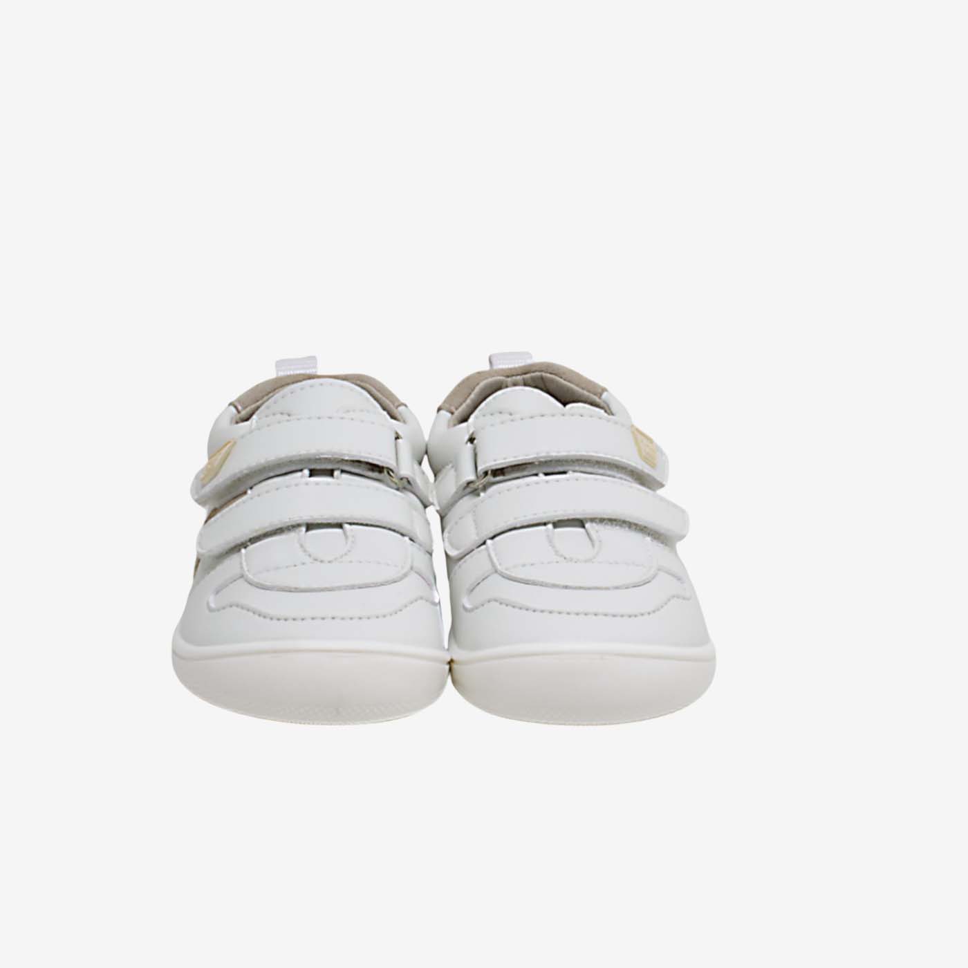 Deportivos respetuoso de primeros pasos en blanco con tonos beige