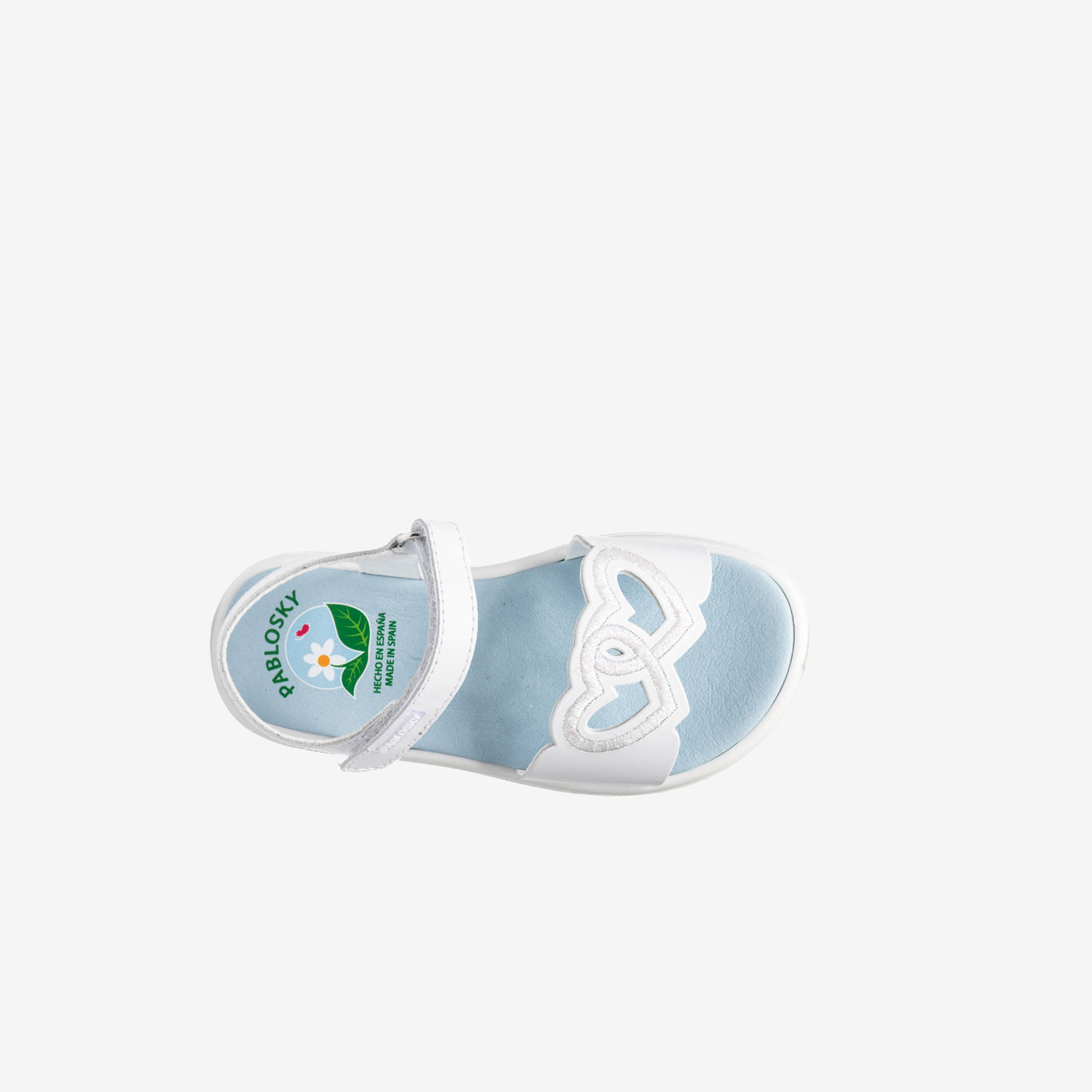 Sandalia blanca con adorno en plata, de Pablosky