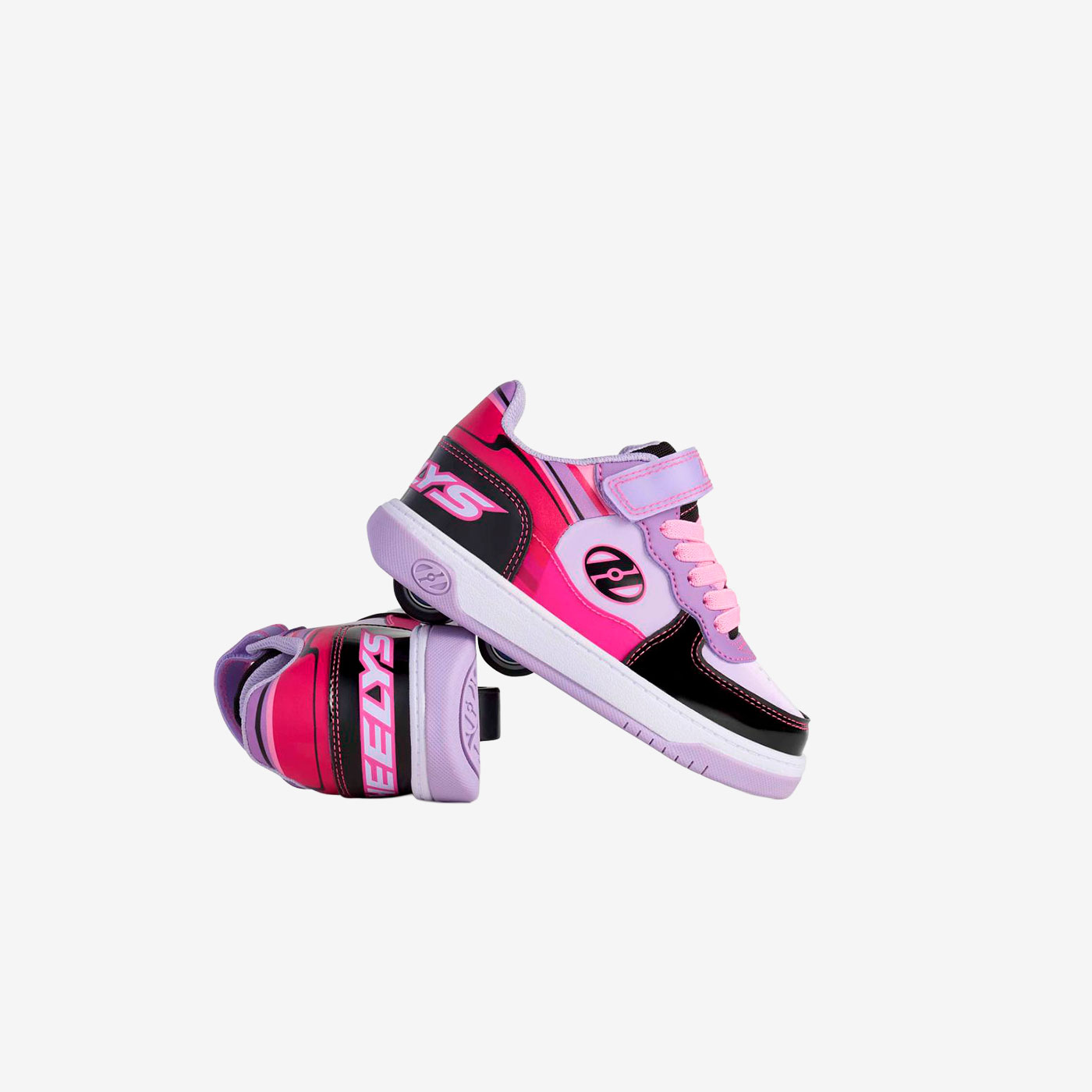 Heelys - Deportivos de doble rueda en color morado, fucsia y negro con ajuste de velcro.