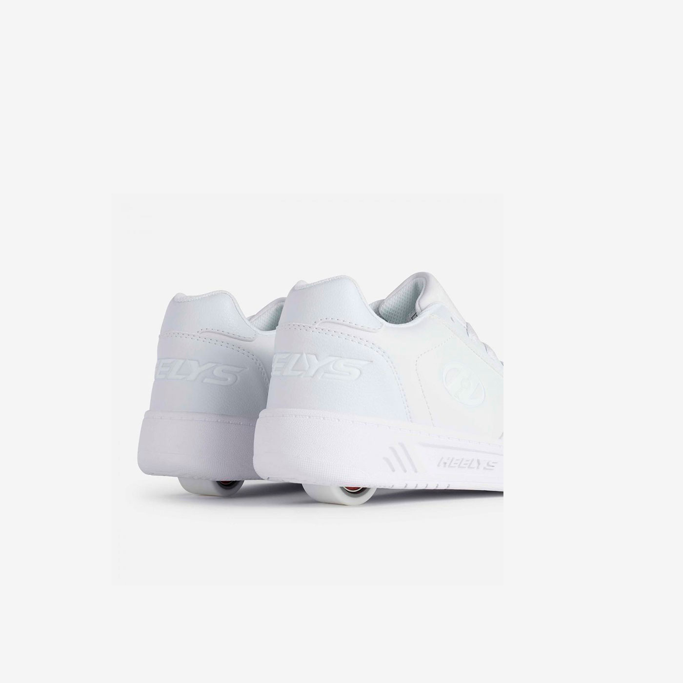 Heelys - Deportivos de rueda en color blanco con cordones.
